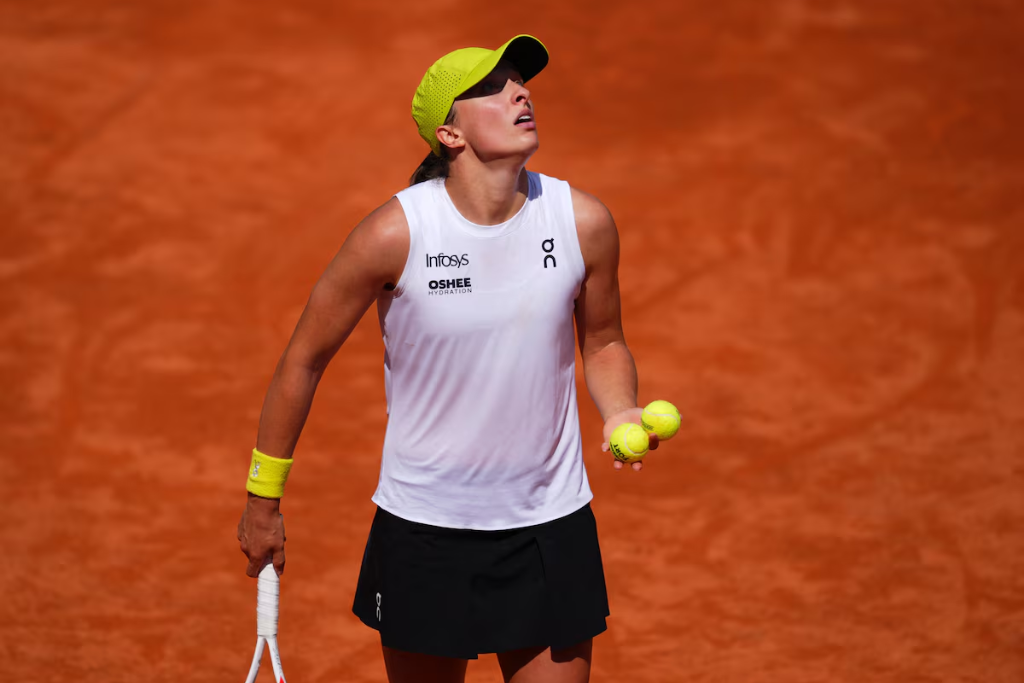 Iga Swiatek’s Italian Open title defence ended early by Collins